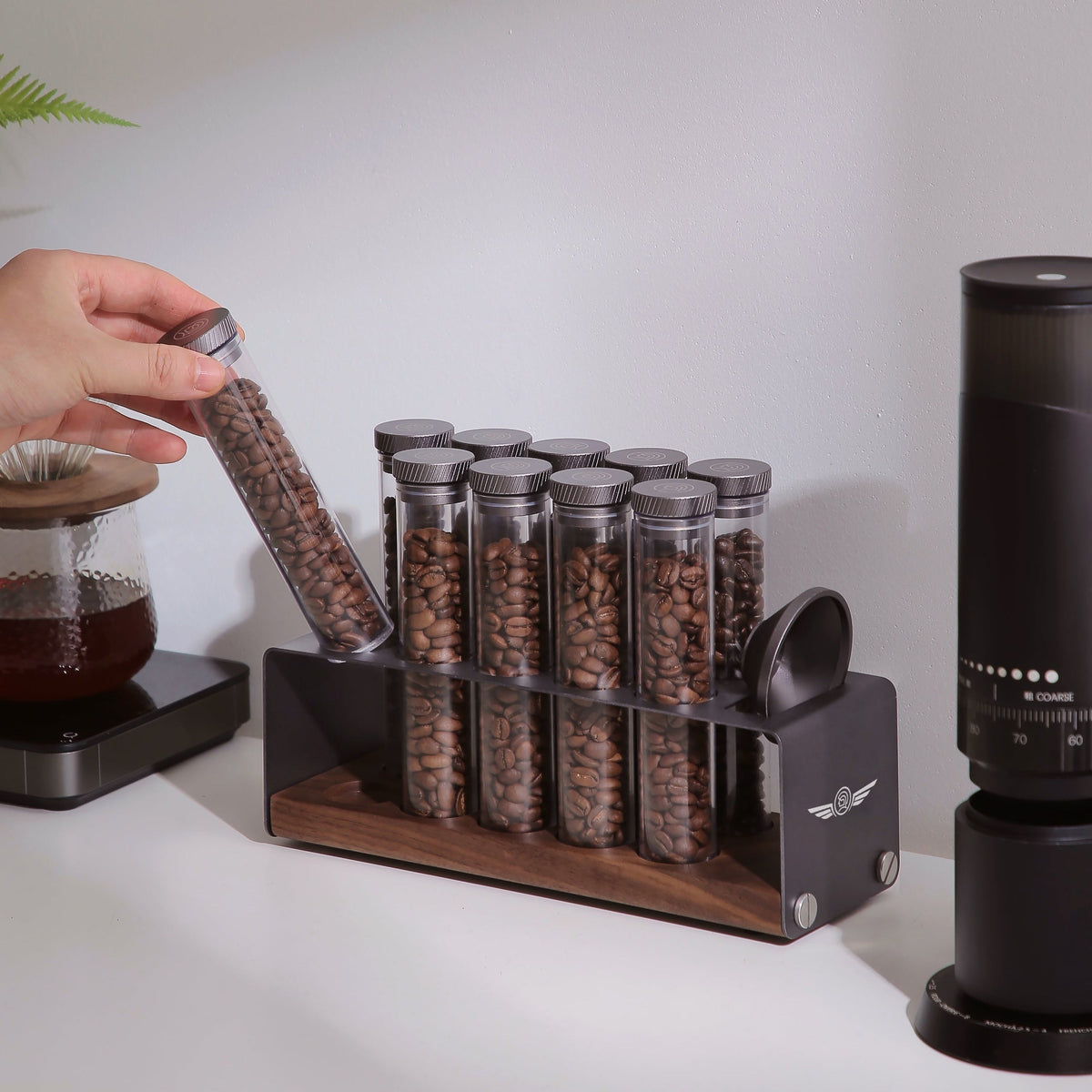zeroHero Single Dose Bean Cellar, ten tubes of coffee beans on the wooden stand