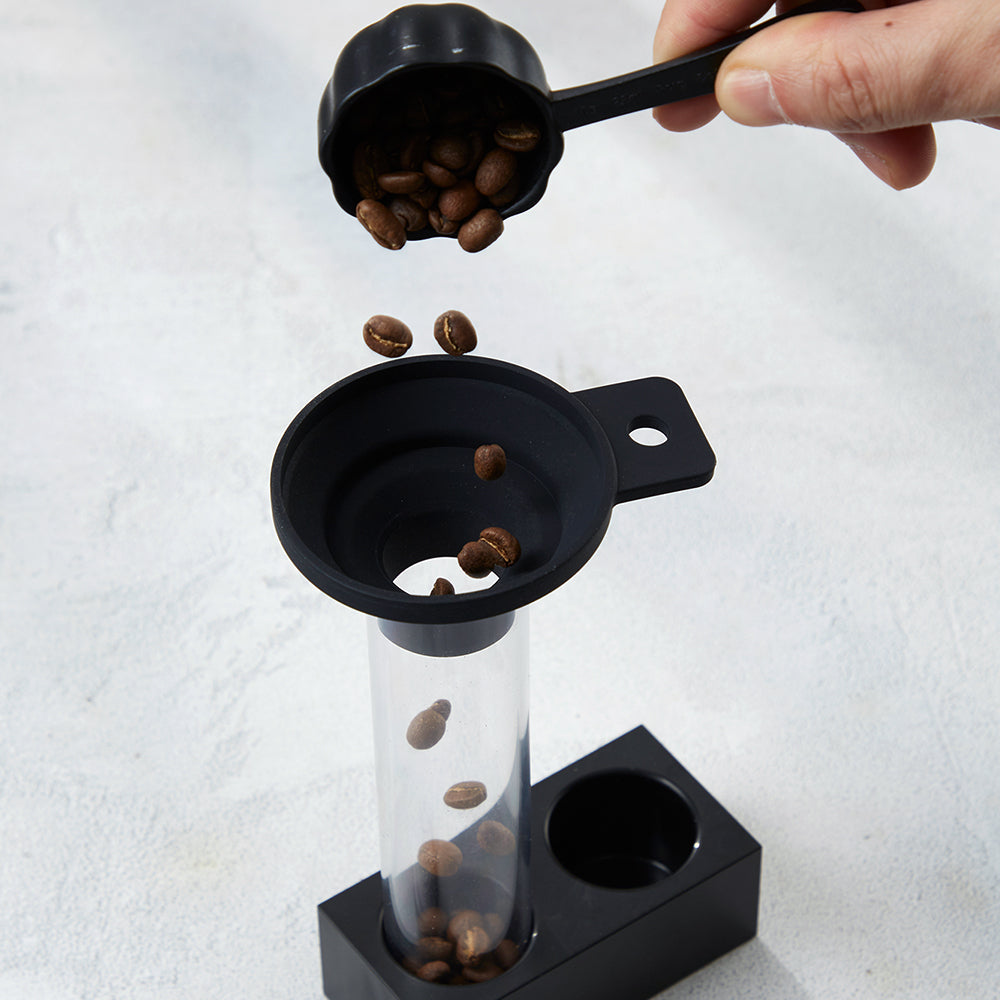 zeroHero Magnetic Bean Cellar Tubes, two tubes of coffee beans on the base