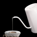 zeroHero Entry-lux electric gooseneck kettle in black on its base, side view