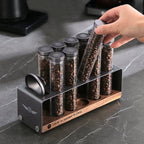 zeroHero Single Dose Bean Cellar, ten tubes of coffee beans on the wooden stand