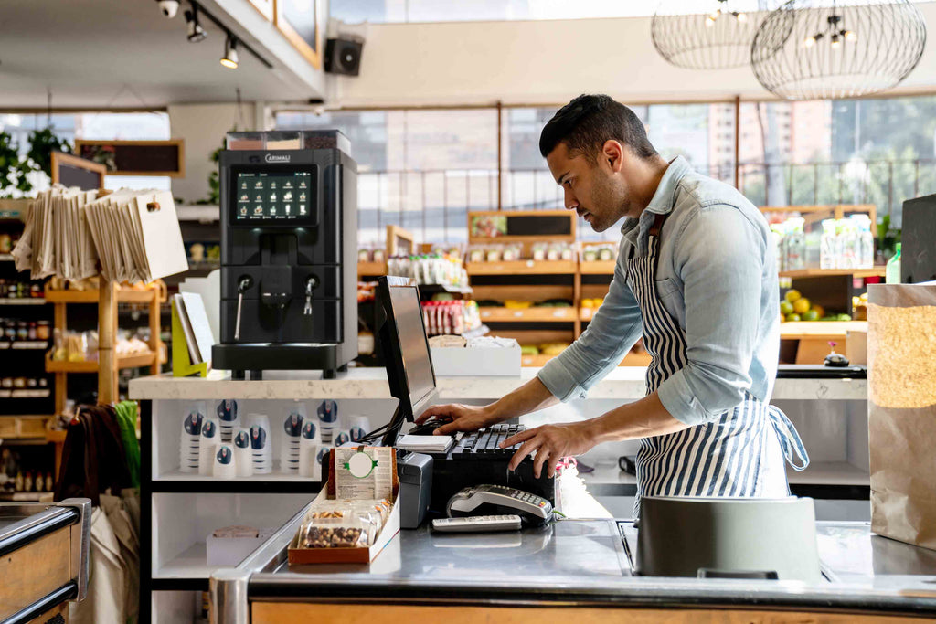 Carimali SilverAce fully automatic coffee machine in black, front view