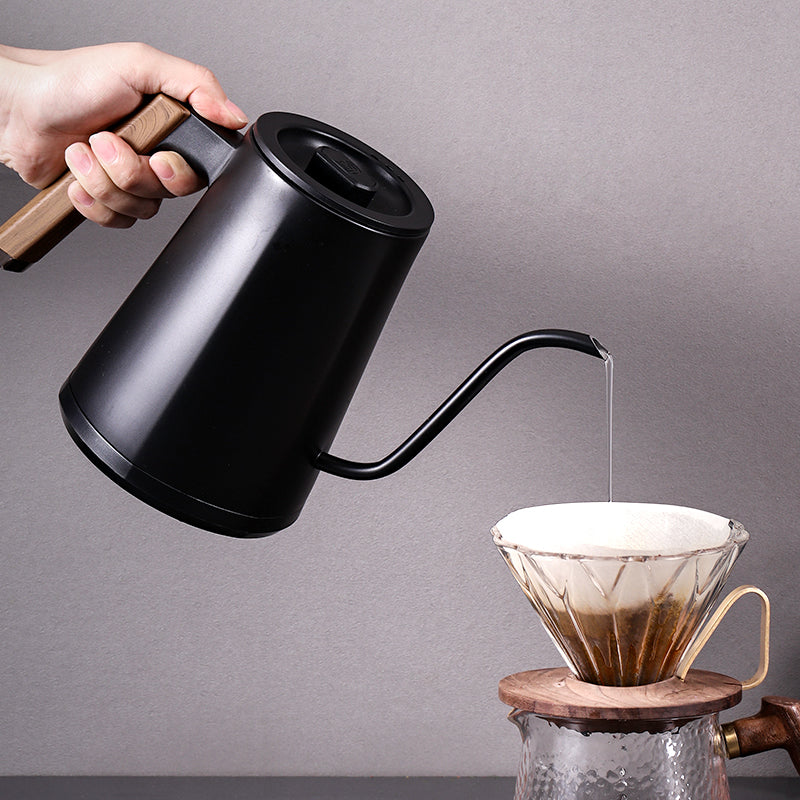 zeroHero Entry-lux electric gooseneck kettle in black on its base, side view
