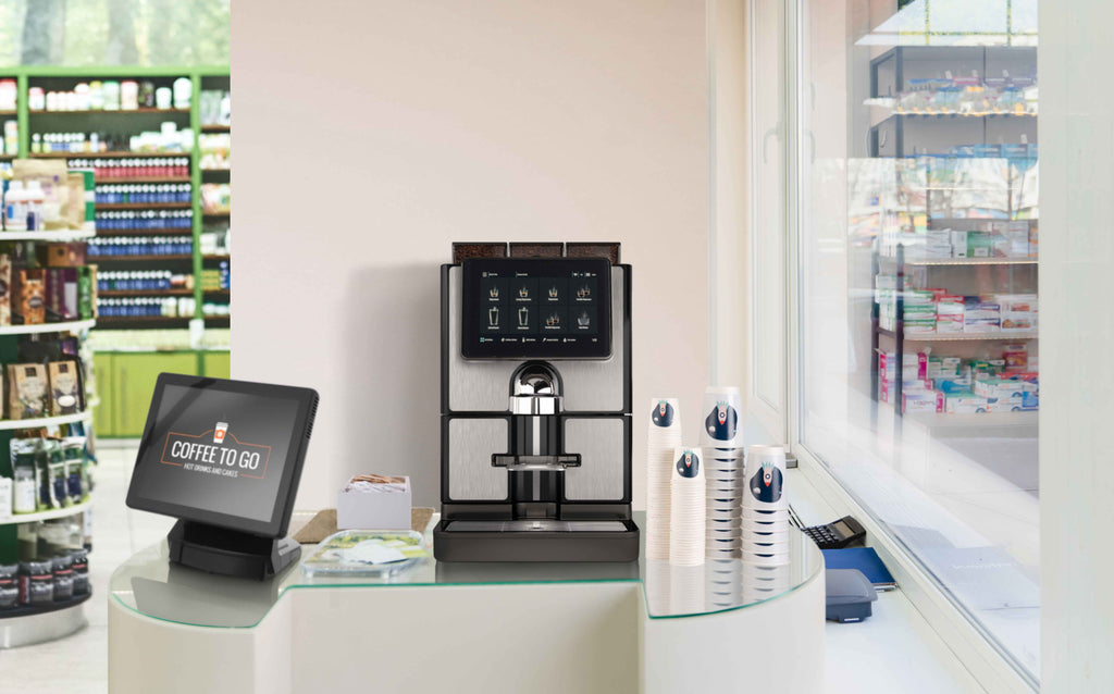 Carimali SilverTwin Plus fully automatic coffee machine in silver and black, front view