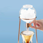 zeroHero Dingyuan Mini ice drip brewer on a stainless steel tripod