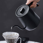 zeroHero WuMing electric gooseneck kettle in black on its base, side view