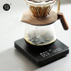 zeroHero Mini Smart Coffee Scale in black, angled view